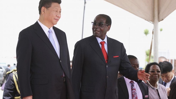 Big thermal power deal crowns rare trip by China`s Xi to Zimbabwe